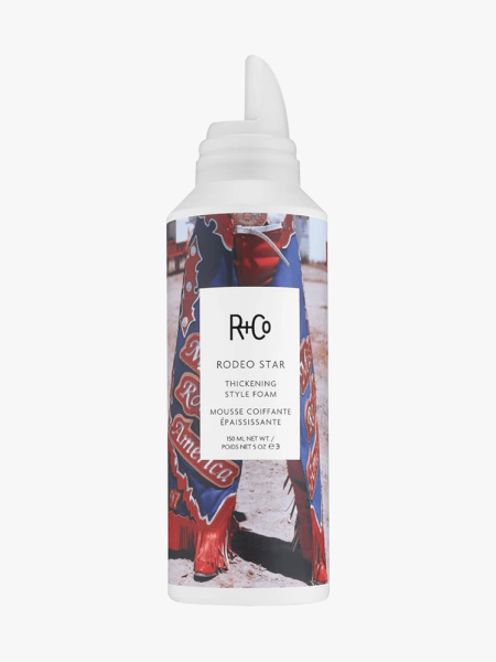 R+Co Rodeo Star Thickening Mousse in branded component on a light gray background